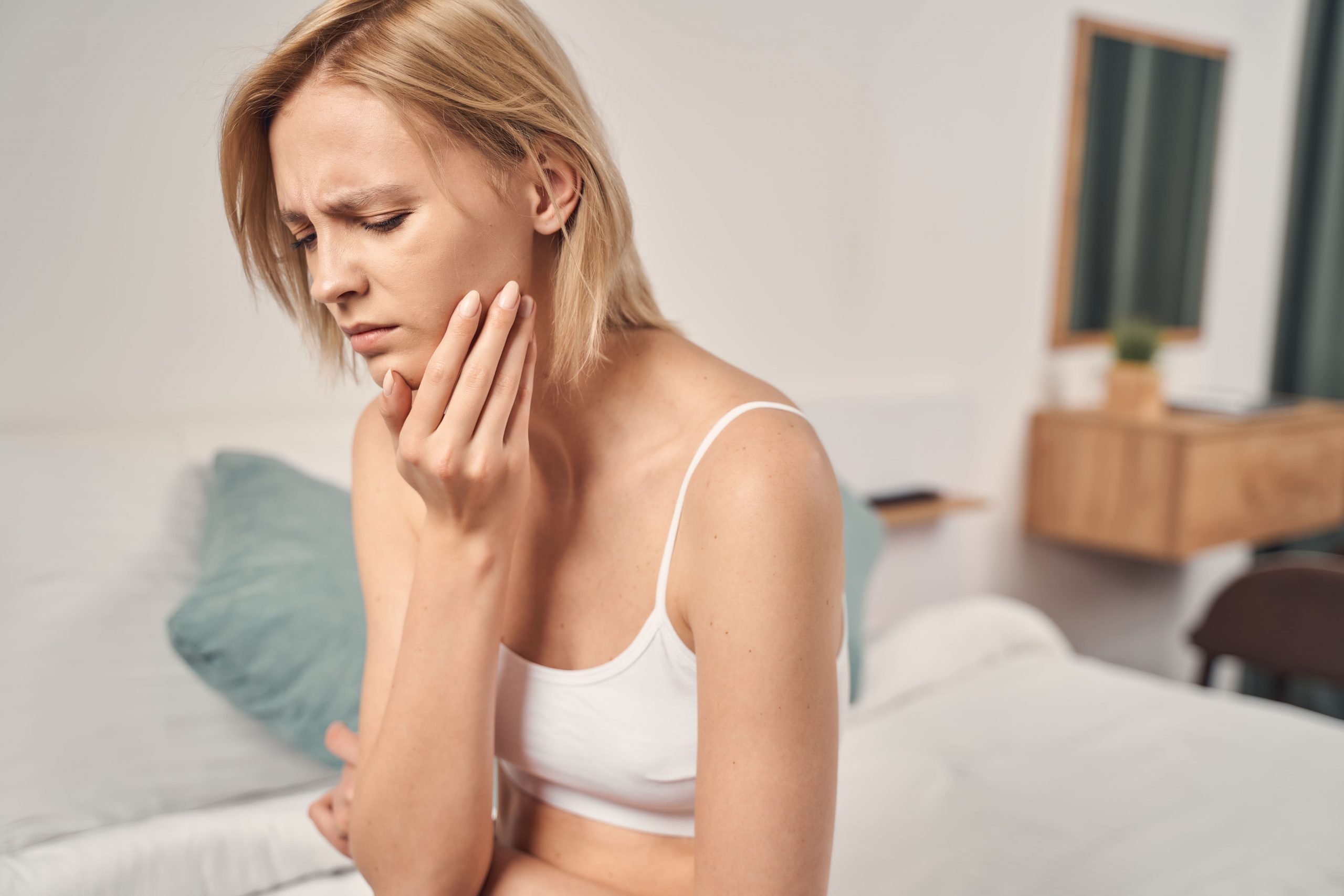https://www.maidstonedental.com.au/wp-content/uploads/2021/09/depressed-young-blonde-woman-having-a-toothache-scaled.jpeg